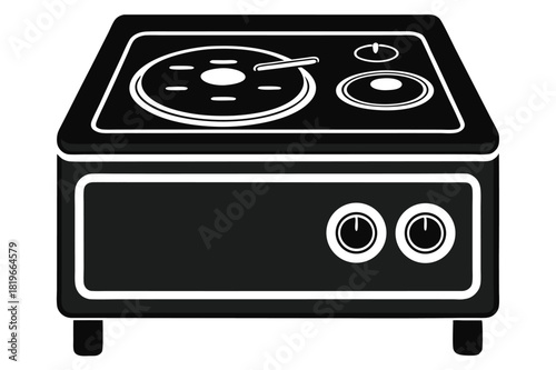 Black and white kitchen stove has circular burners and temperature control knobs at the front
