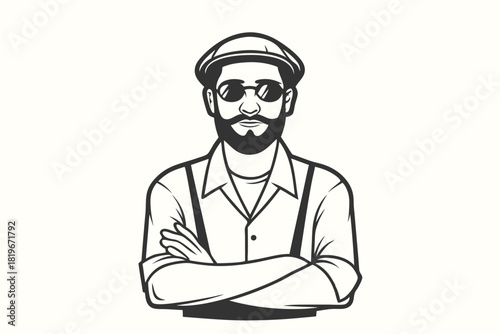 Confident bearded man wearing glasses and cap poses with arms crossed in monochrome