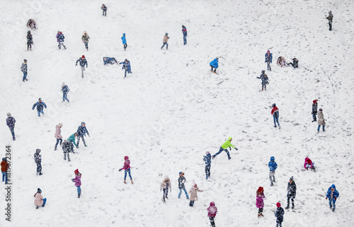 Snow Winter Children without recognizable faces Playing in the school yard