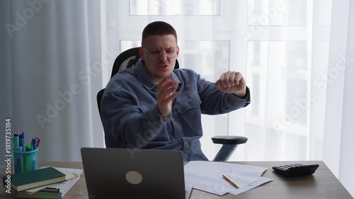 A joyful businessman dances in his office after closing a lucrative deal with a client.
Promotion and success at work.
A businessman's emotions after signing a contract.