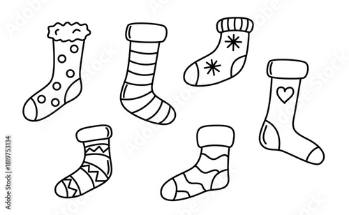 Vector winter socks variations linear coloring page. Isolated on white hand drawn socks with different patterns