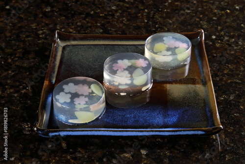 Kingyoku Kan is a translucent Japanese gelatin made with agar-agar (a seaweed gelatin) that is decorated with fruits or other elements to create beautiful scenes, like a work of art.