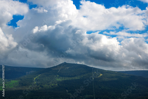 Fototapeta Naklejka Na Ścianę i Meble -  view of mountain Szrenica, Karkonosze, Poland.  landscape with blue sky with clouds