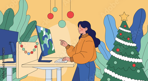 Woman working at desk with Christmas decorations in office.