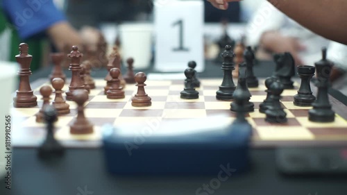 close up of hands playing chess. Chess game