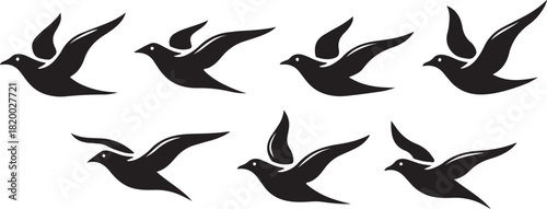 Collection of flying bird silhouettes, depicting doves or pigeons in various flight poses, symbolizing freedom and peace, isolated on white background.