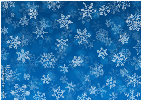 白い雪の結晶が散りばめられた冬の幻想的な青いベクター背景