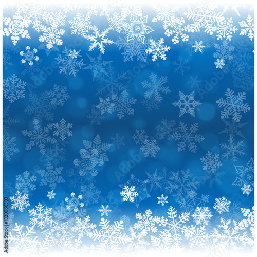 白い雪の結晶が散りばめられた冬の幻想的な青いベクター背景