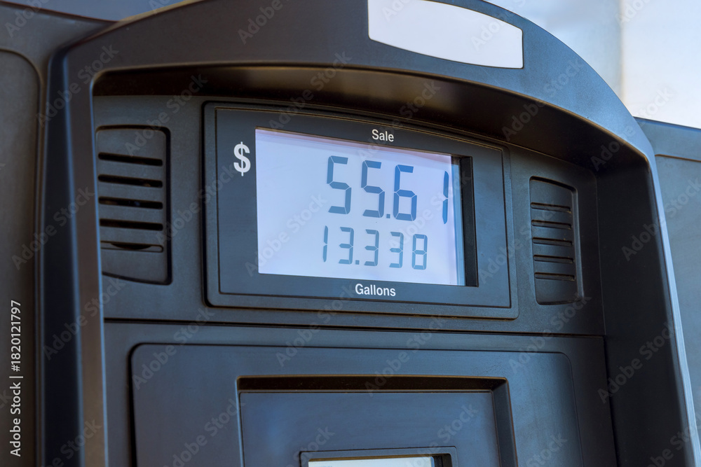 Fototapeta premium Gas station pump displays total sale amount gallons pumped