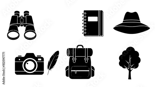 Vector illustration of collection of black silhouette icons representing travel, exploration, adventure, and nature gear isolated on transparent background