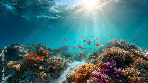 Fototapeta Naklejka Na Ścianę i Meble -  Vibrant coral reef ecosystem thrives beneath sunlit ocean surface