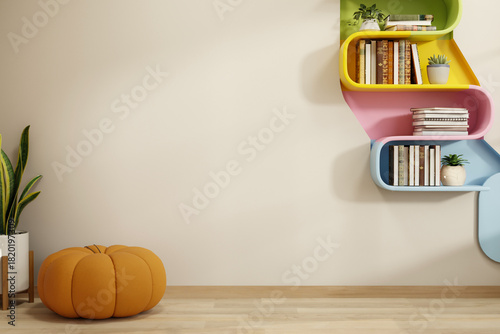 Fototapeta Naklejka Na Ścianę i Meble -  Colorful hanging bookshelf on wall and pumpkin stool with pot plant on wooden floor in a living room