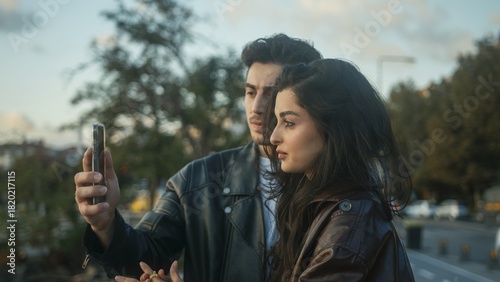 Couple Taking Selfie Together in Urban Setting
