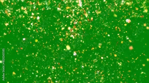 Festive Confetti Falling on Green Screen - A vibrant video showing gold and red confetti falling against a green screen background.