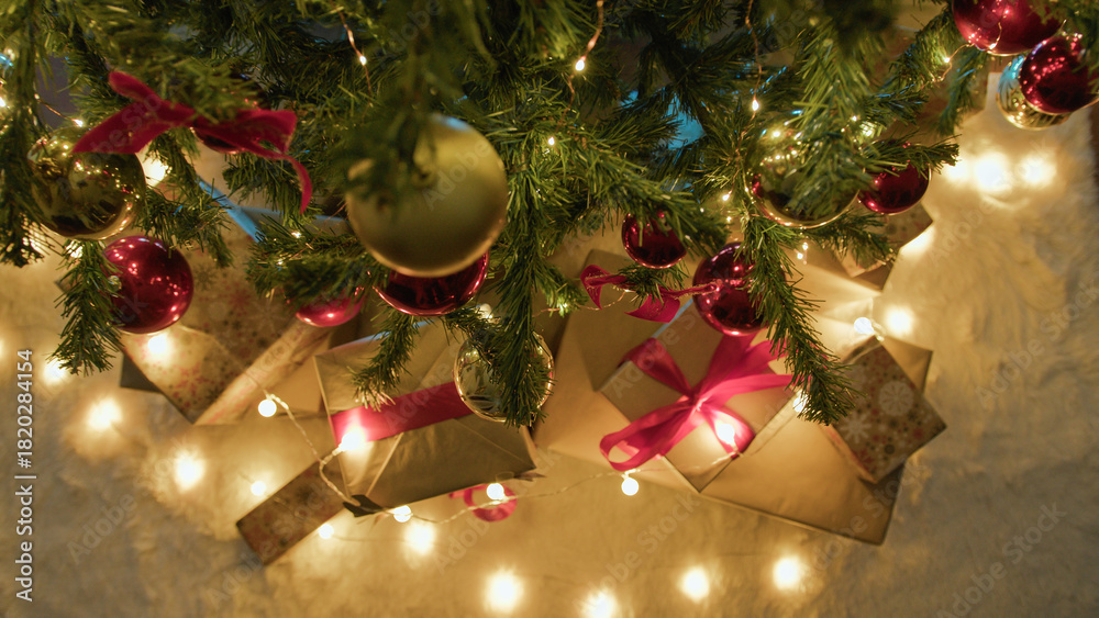 Fototapeta premium Christmas gift boxes under Christmas tree