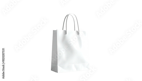 White paper shopping bag with handles on a black background, studio shot