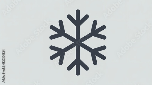 Simple dark snowflake icon on a light gray background