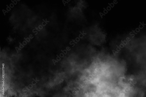 A grayscale image showing a dense cloud of smoke against a dark background texture