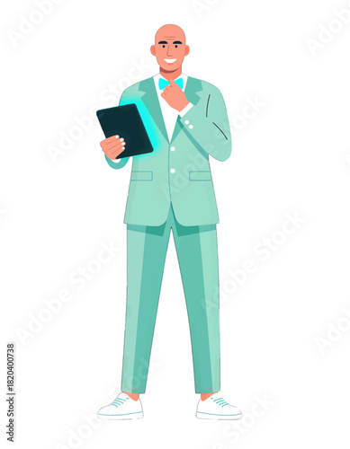 Stylish businessman in a teal suit holding a tablet