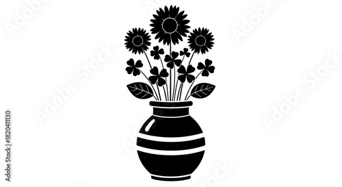 Elegant vase holding beautiful floral arrangement with lucky clovers