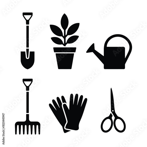 Gardening tools collection spade plant watering can rake gloves and scissors