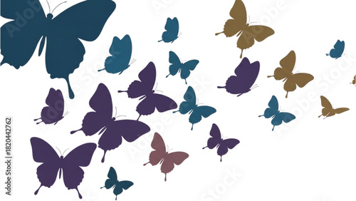 Beautiful Butterflies in Flight Against a White Background