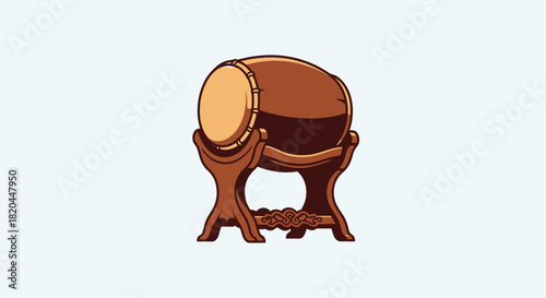 Illustration of a traditional brown drum resting on a wooden stand, set against a light blue background.