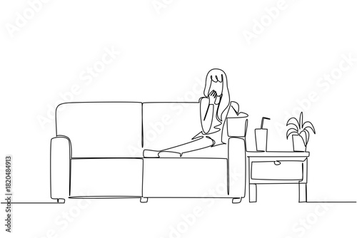 One line draw of a woman lying down on a couch with popcorn bucket, watching a show and reaching for a drink on a side table. Evoking comfort, leisure, and cinematic escape. National Movie Night event