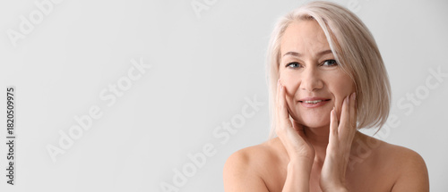 Mature woman giving herself...