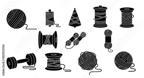 A collection of black and white yarn balls and thread spools images