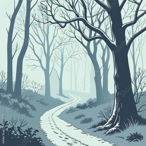 Winding path through a misty winter forest with bare trees