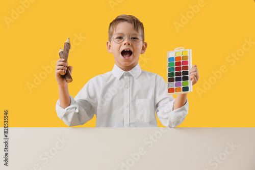 Little boy with watercolor ...