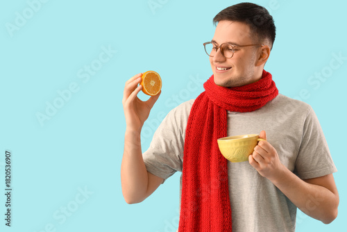 Ill young man with orange a...