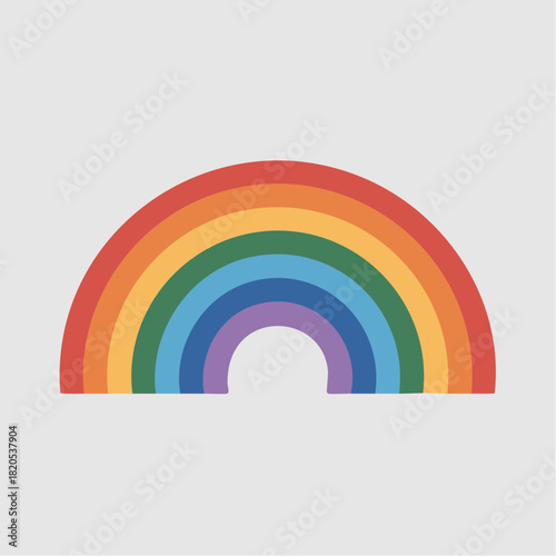 A simple, colorful, arched rainbow with seven distinct color bands against a light grey background.