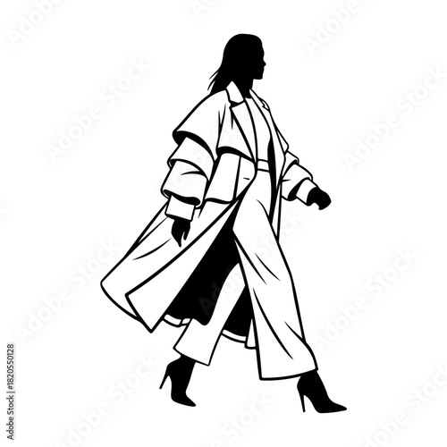 Silhouette of a woman in a coat and pants walking in high heels shoes