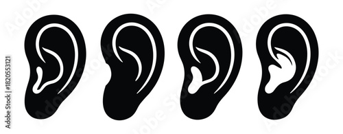 Collection of four human ear shapes. Different ear types isolated on a white background.
