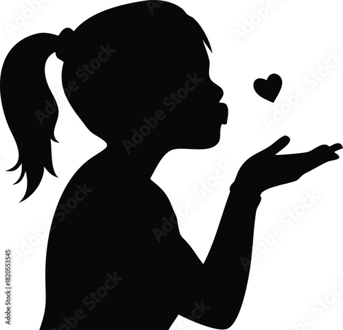 Silhouette of a girl blowing a heart shaped kiss with a gentle loving