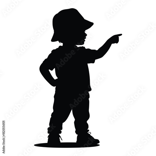 Silhouette of a young child wearing a hat and pointing with one hand, standing with the other hand on their hip, isolated on