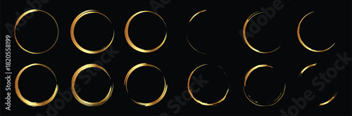 Golden hand drawn round frames. Gold circle brush strokes set. Isolated on black background