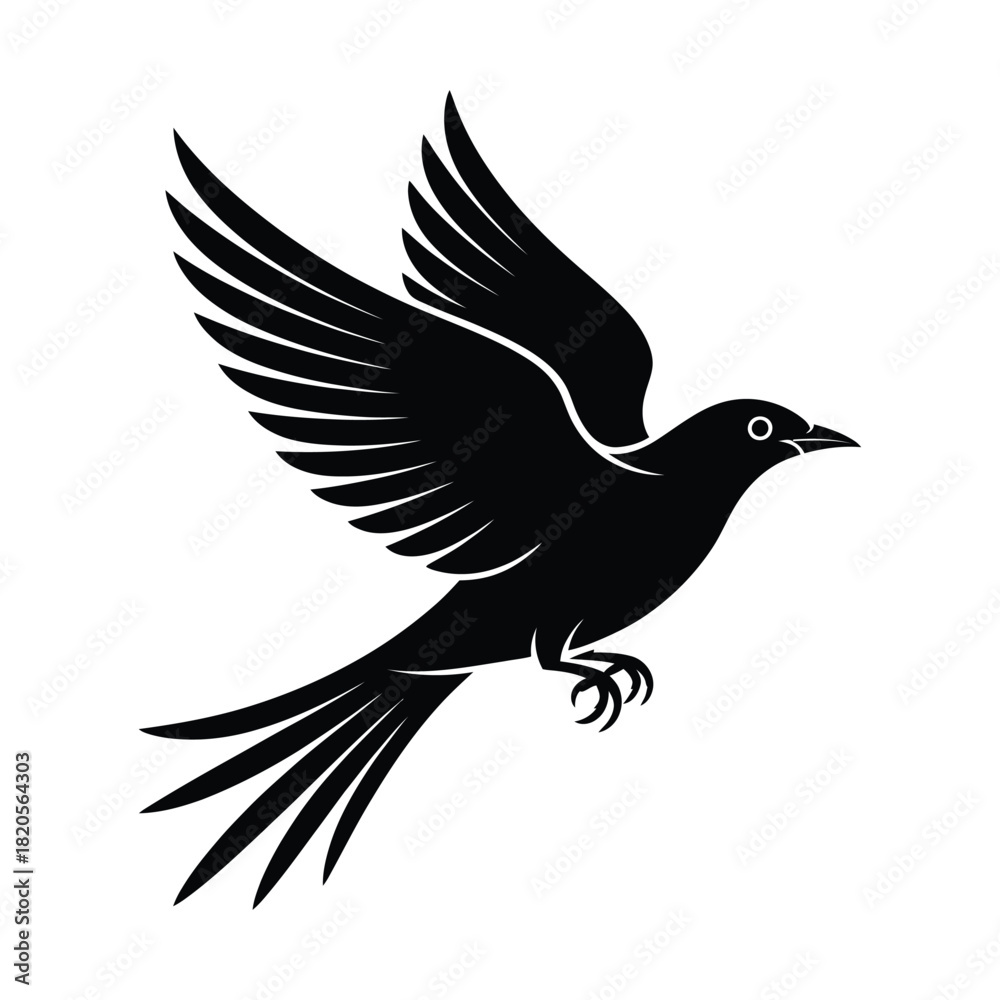 Fototapeta premium Black bird in flight, a graceful silhouette with wings spread, symbolizing freedom, nature, and movement, isolated on