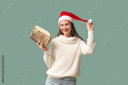 Happy young woman in Santa ...