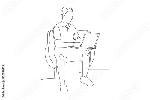 Man working while sitting on the sofa. Working from sofa concept one-line drawing