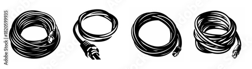 Set of four coiled black ethernet network cables with rj45 connectors for internet connectivity and data transfer