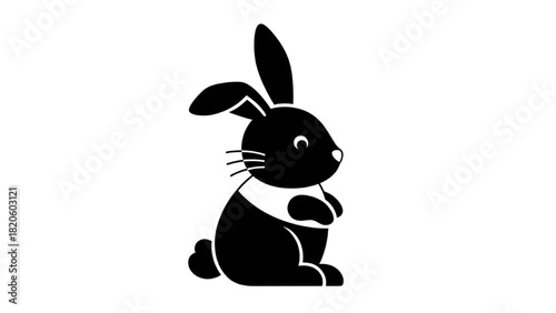 Charming black silhouette of a playful rabbit standing upright, a simple and elegant animal illustration for design projects
