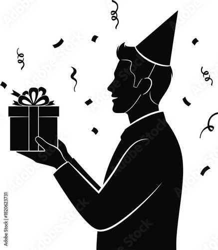 Black silhouette of a man wearing a party hat, happily holding a gift box, with confetti celebrating a special event, isolated on white