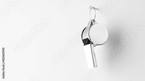 Photos The whistle of the coach, hanging on a nail, represents the coach's philosophy