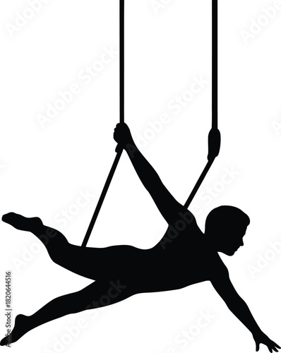 Silhouette of a male aerial acrobat suspended from ropes on a white background Keywords: aerial acrobatics, silhouette, aerialist, circus, performance, sport, athlete, man
