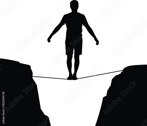 Silhouette of a person balancing on a slackline between two cliffs on a white background Keywords: silhouette, person, man, balancing, slackline, tightrope, walking, extreme