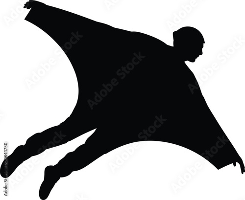 Silhouette of a person in a wingsuit flying through the air skydiving BASE jumping