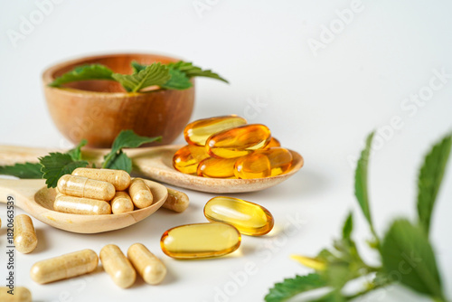 Medicine herbal organic capsule vitamin E omega 3 fish oil drug herbs leaf natural supplements
